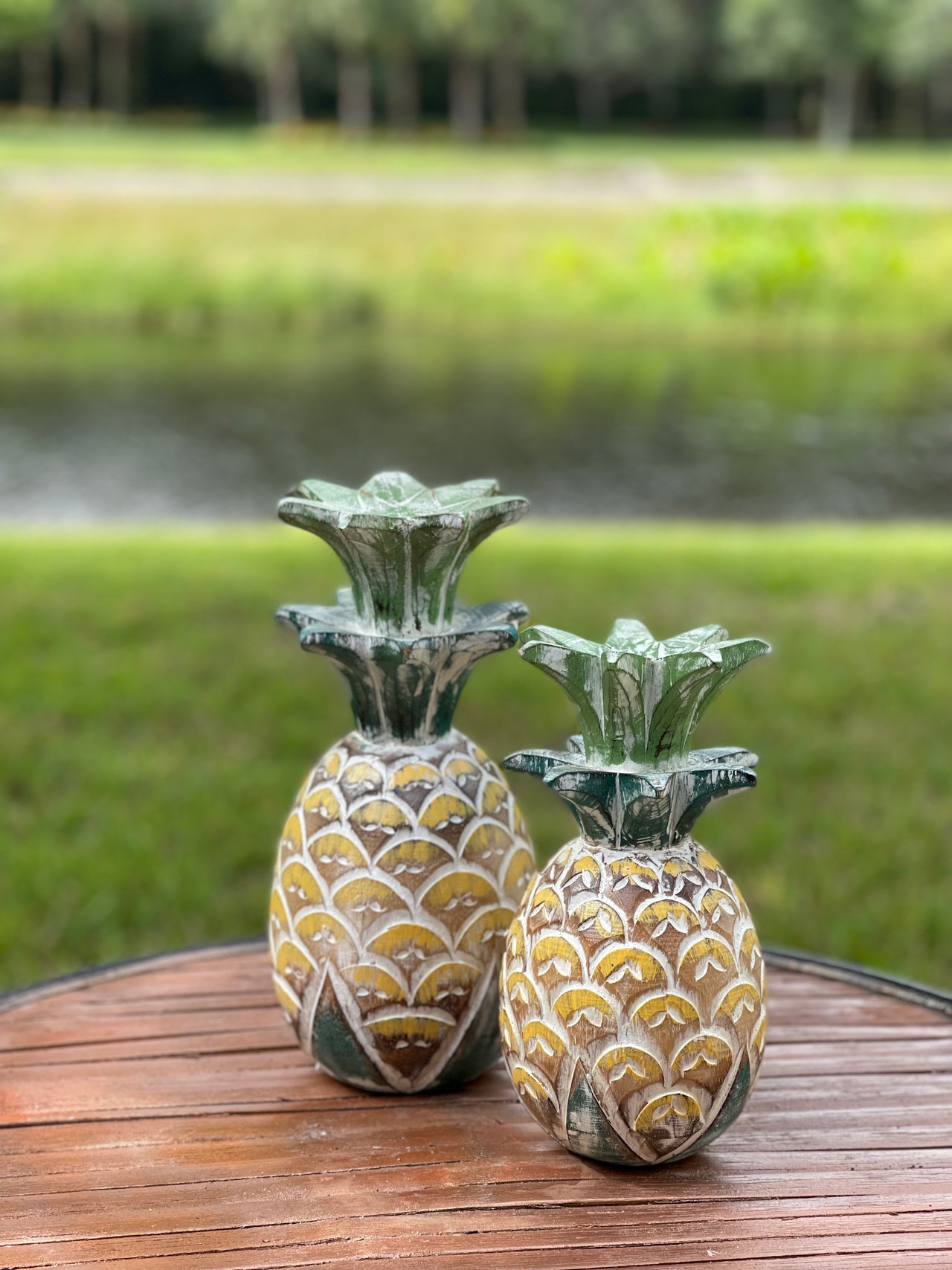 Wooden realistic large pineapple carvings set of 2