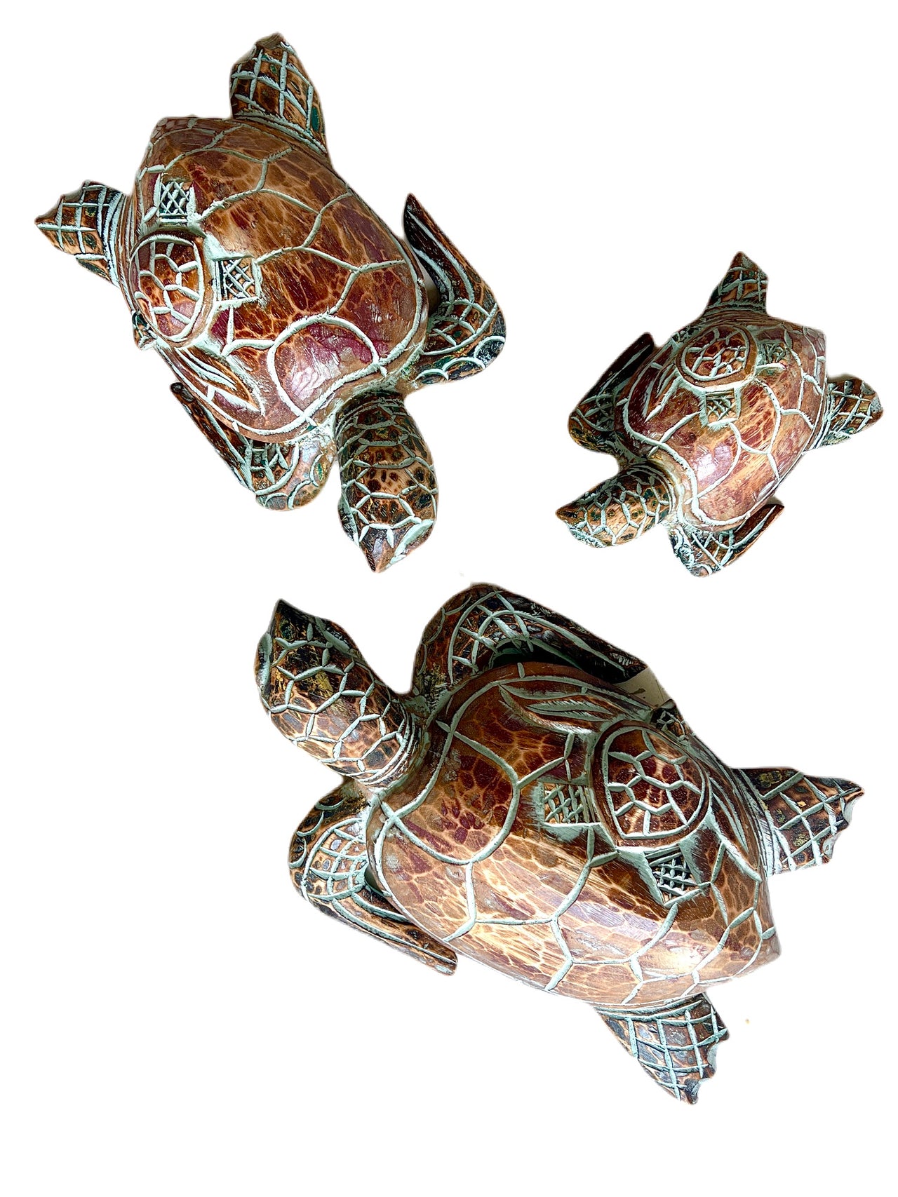 Unique Indonesian turtle family of 3 wood carvings .