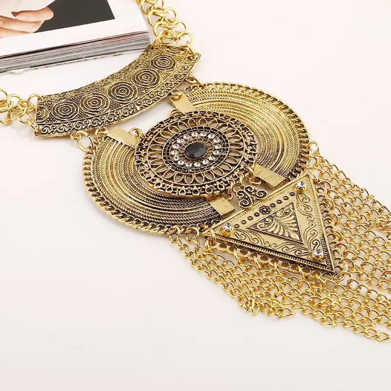 Glamorous gold boho gypsy necklace statement piece.