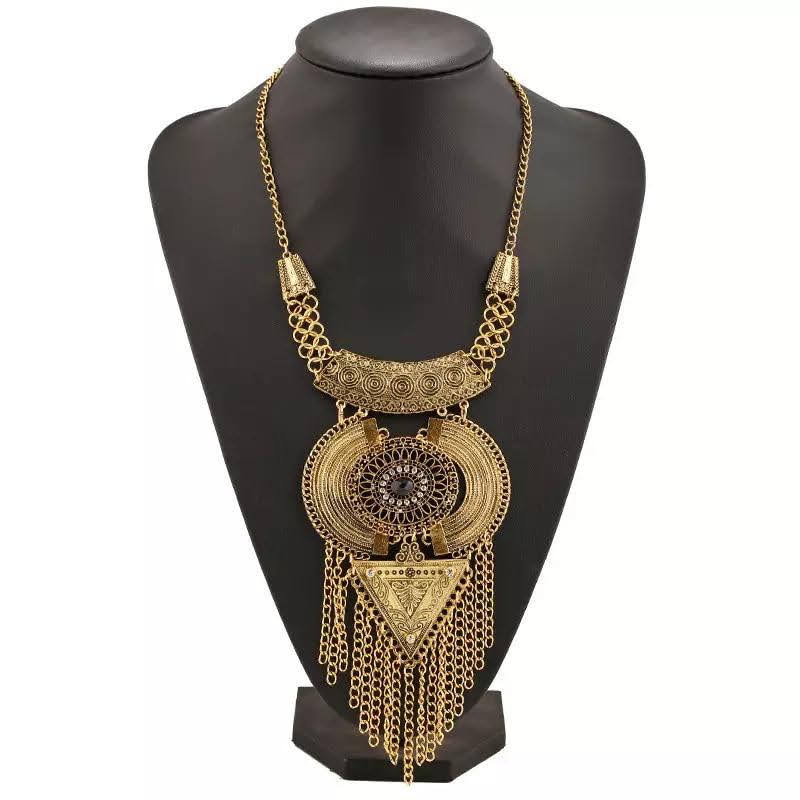 Glamorous gold boho gypsy necklace statement piece.