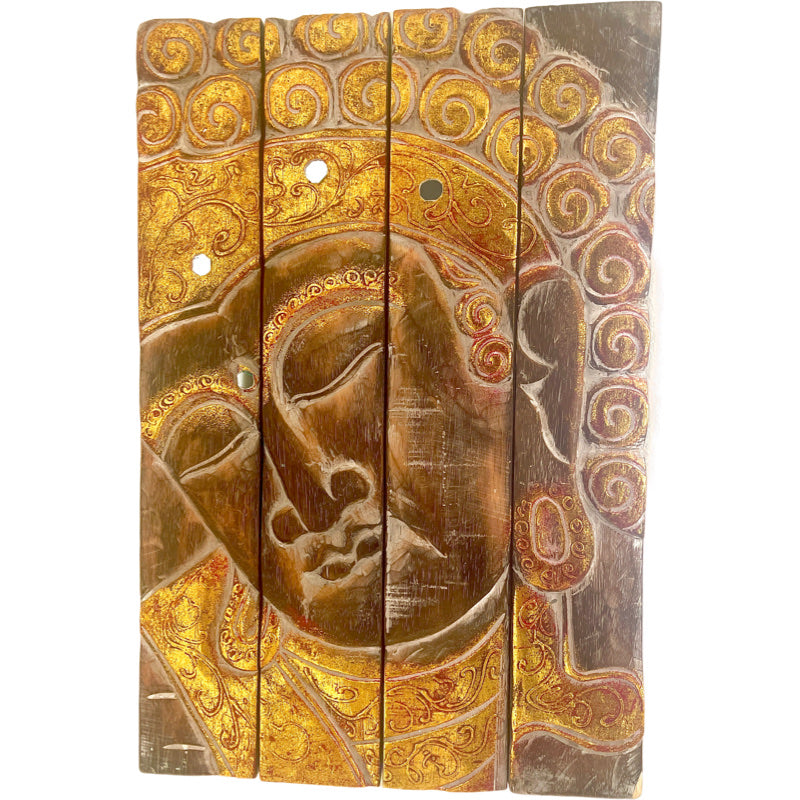 Gold Buddha face wood panel carving
