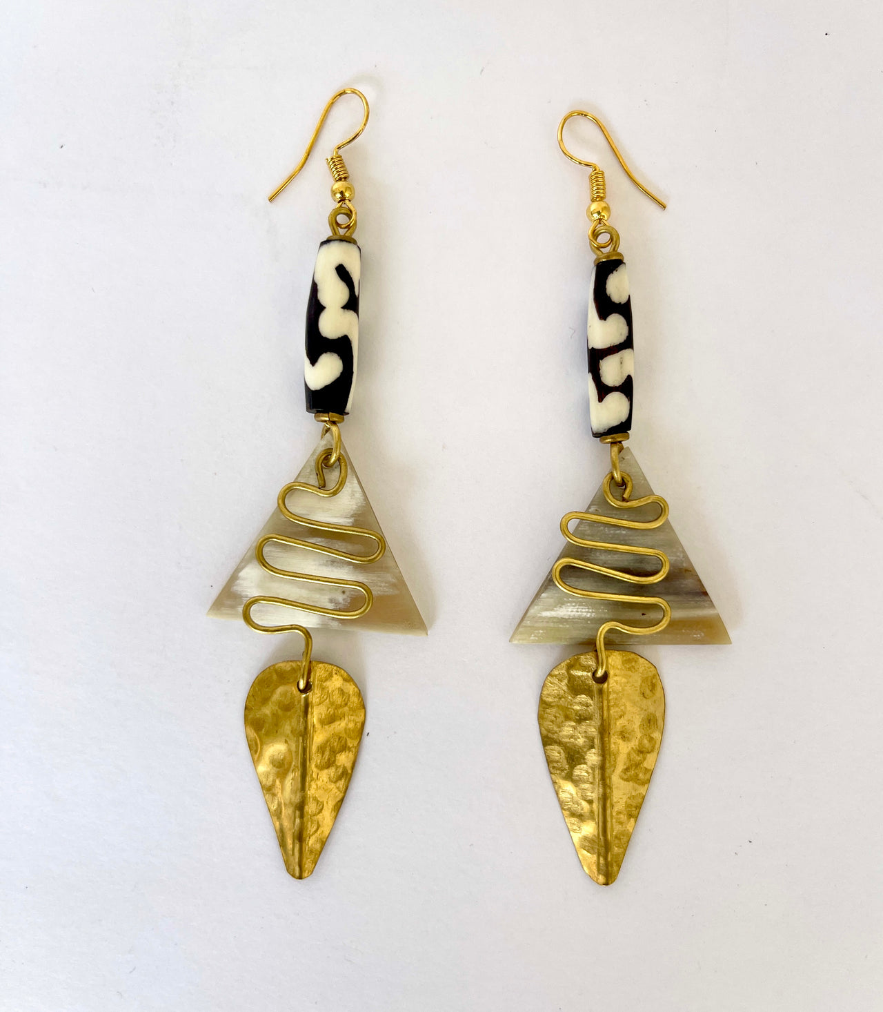 Bone brass earrings with African designs